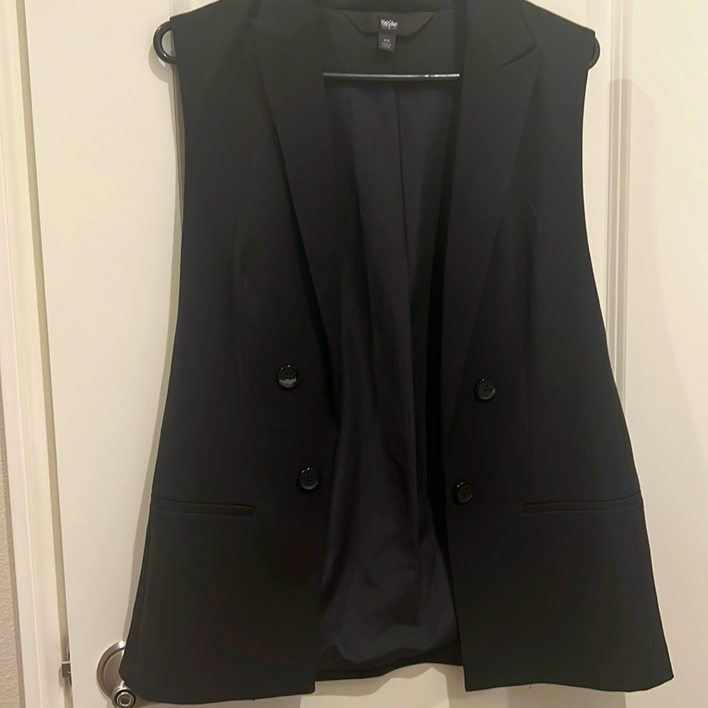 Vest color black good condition size m